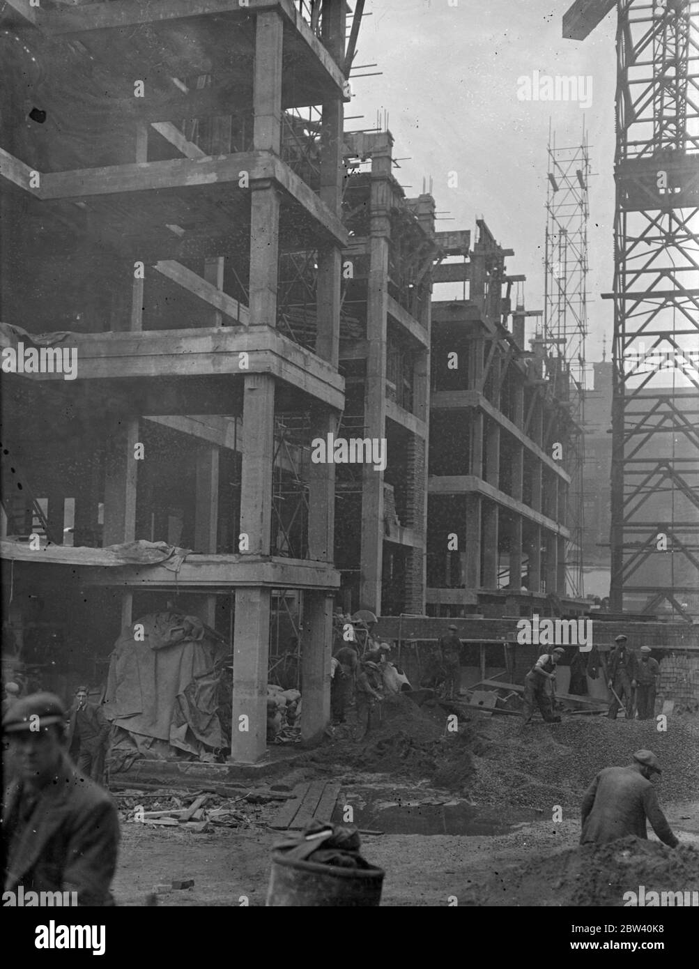 Men engaged on the building of a new wing at the Great Ormond Street Hospital declared a sudden strike. The dispute is believed to be concerned with the scaffolding. Photo shows: The scene of the strike. 6 April 1937 Stock Photo