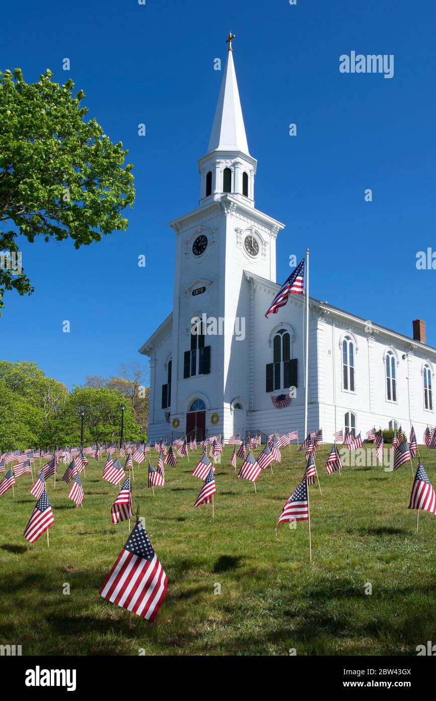 Fist Congregational Church (1870) - Yarmouth Port, Massachusetts, Cape Cod.   Memorial Day flags - 2020 Stock Photo