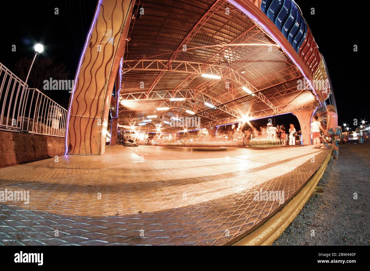 bumper cars in amusement park. long exposure bumper cars. night shot in