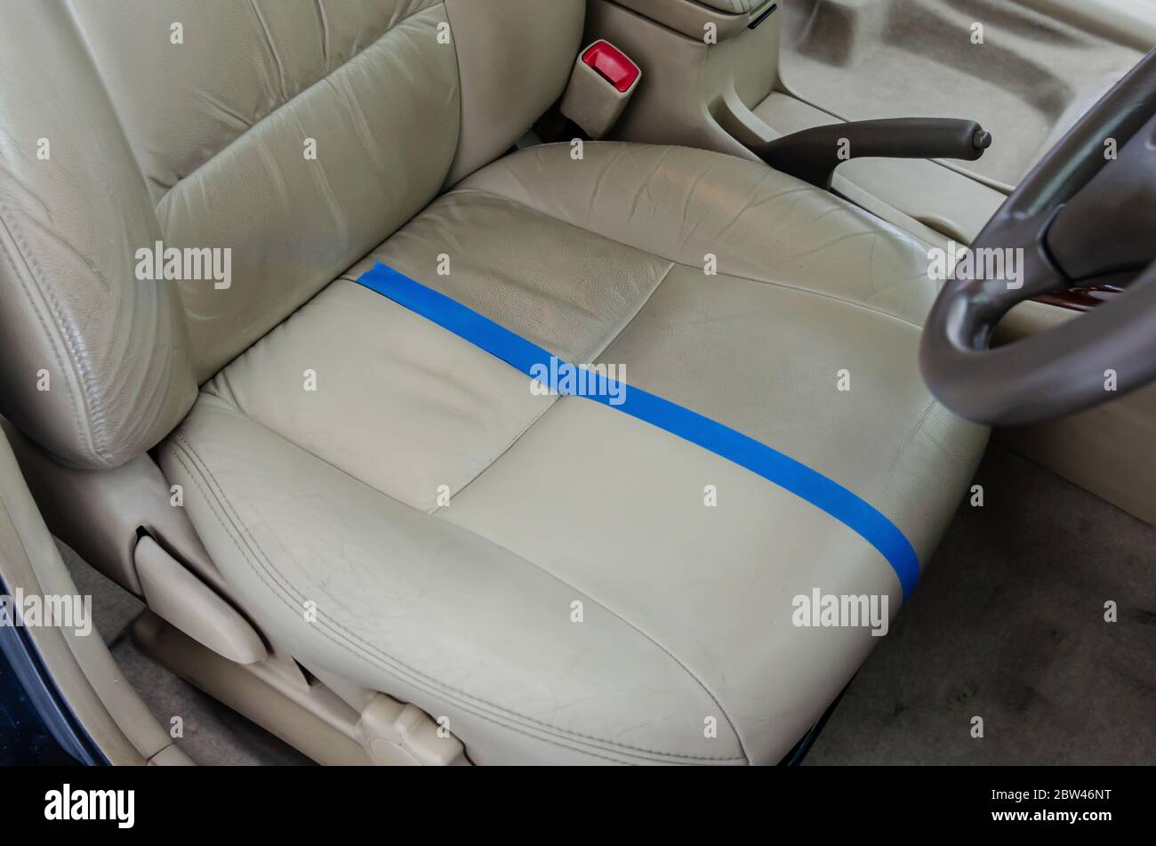 Before and after the leather seat cleaning service Stock Photo Alamy