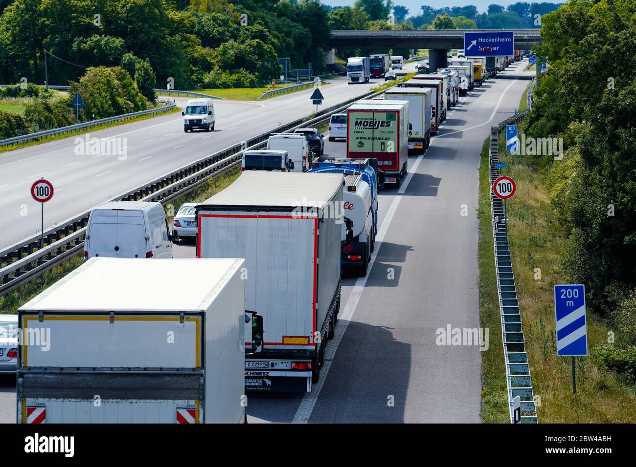 29 May 2020, Baden-Wuerttemberg, Hockenheim: Trucks and cars are stuck in a traffic jam on the Autobahn 6 near Hockenheim in the direction of Speyer. In Bavaria and Baden-Wuerttemberg two-week Whitsun holidays begin. The ADAC sees danger of traffic jams on the motorways especially on Friday afternoon and early evening as well as on Saturday morning and Monday afternoon. Photo: Uwe Anspach/dpa Stock Photo