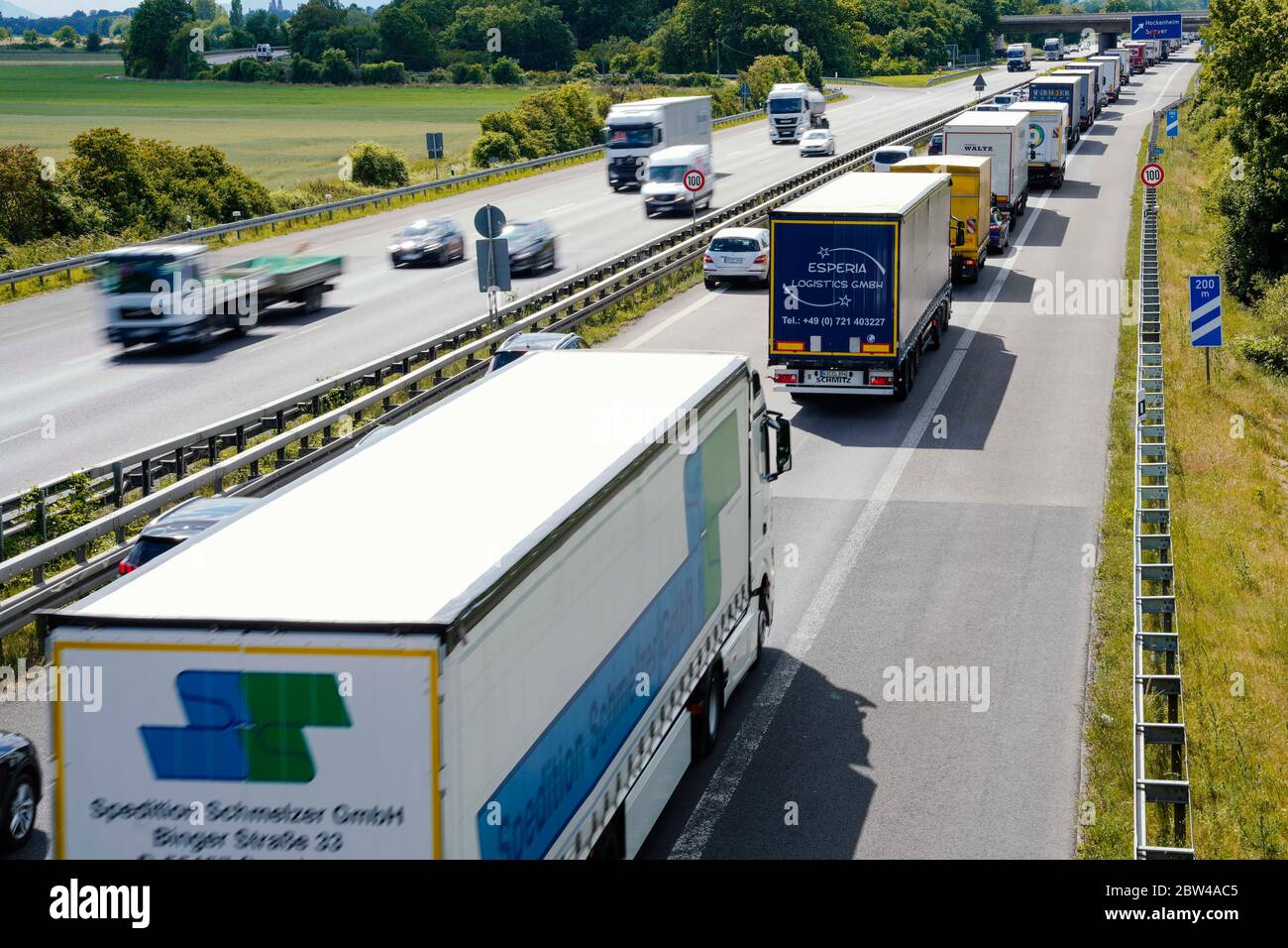 29 May 2020, Baden-Wuerttemberg, Hockenheim: Only slowly trucks and cars drive on the Autobahn 6 near Hockenheim in direction Speyer. In Bavaria and Baden-Württemberg, two-week Whitsun holidays begin. The ADAC sees danger of traffic jams on the motorways especially on Friday afternoon and early evening as well as on Saturday morning and Monday afternoon. Photo: Uwe Anspach/dpa Stock Photo