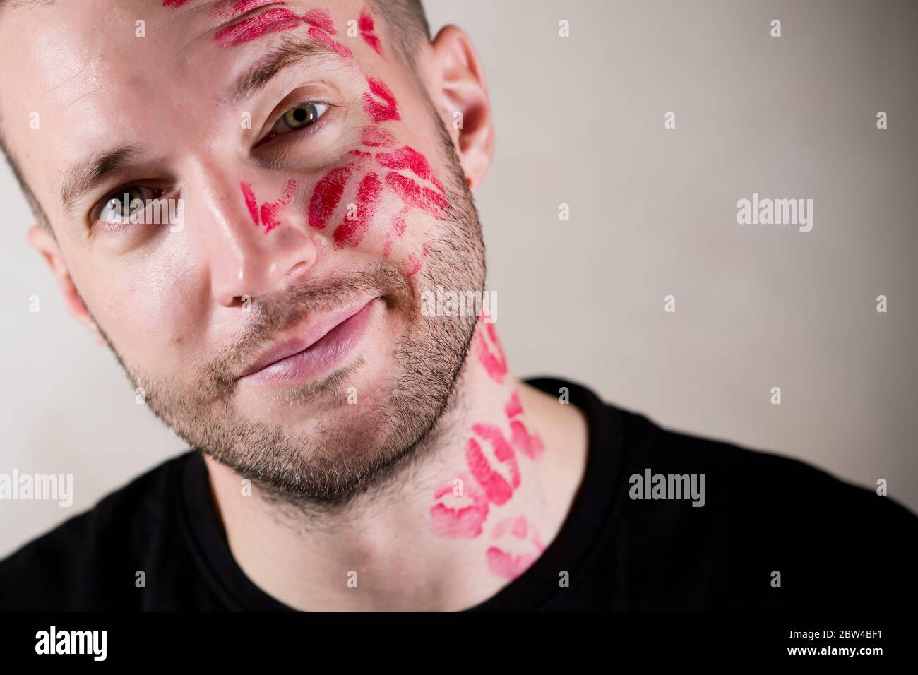 Young man lipstick mark on cheek hi-res stock photography and images - Alamy