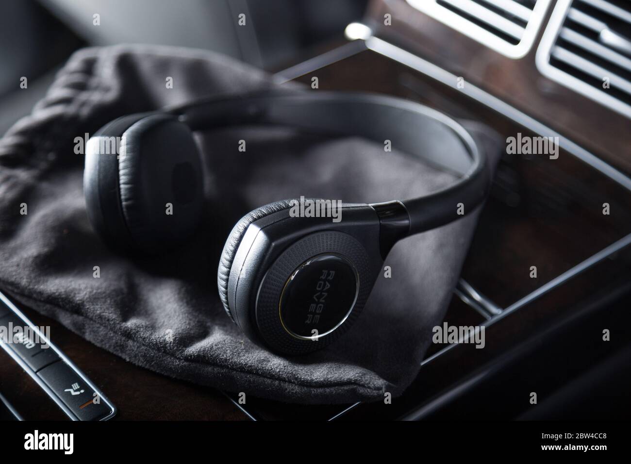 Range Rover branded headphones in car interior Stock Photo - Alamy