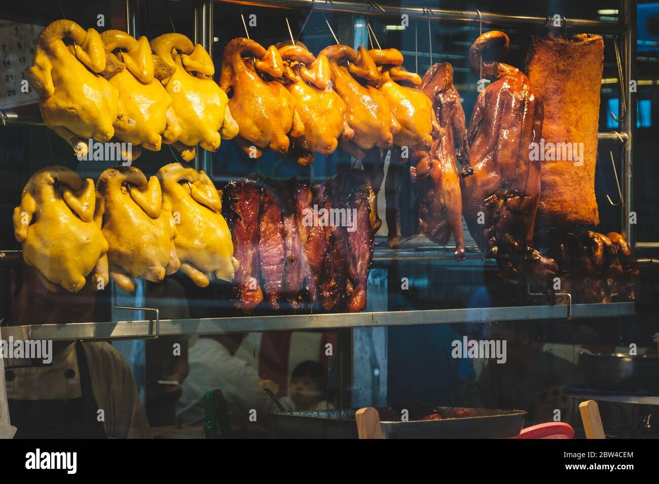 Hong Kong - November, 2019: Roasted ducks, peking duck and roast goose, a common picture in restaurant window of Hong Kong Stock Photo