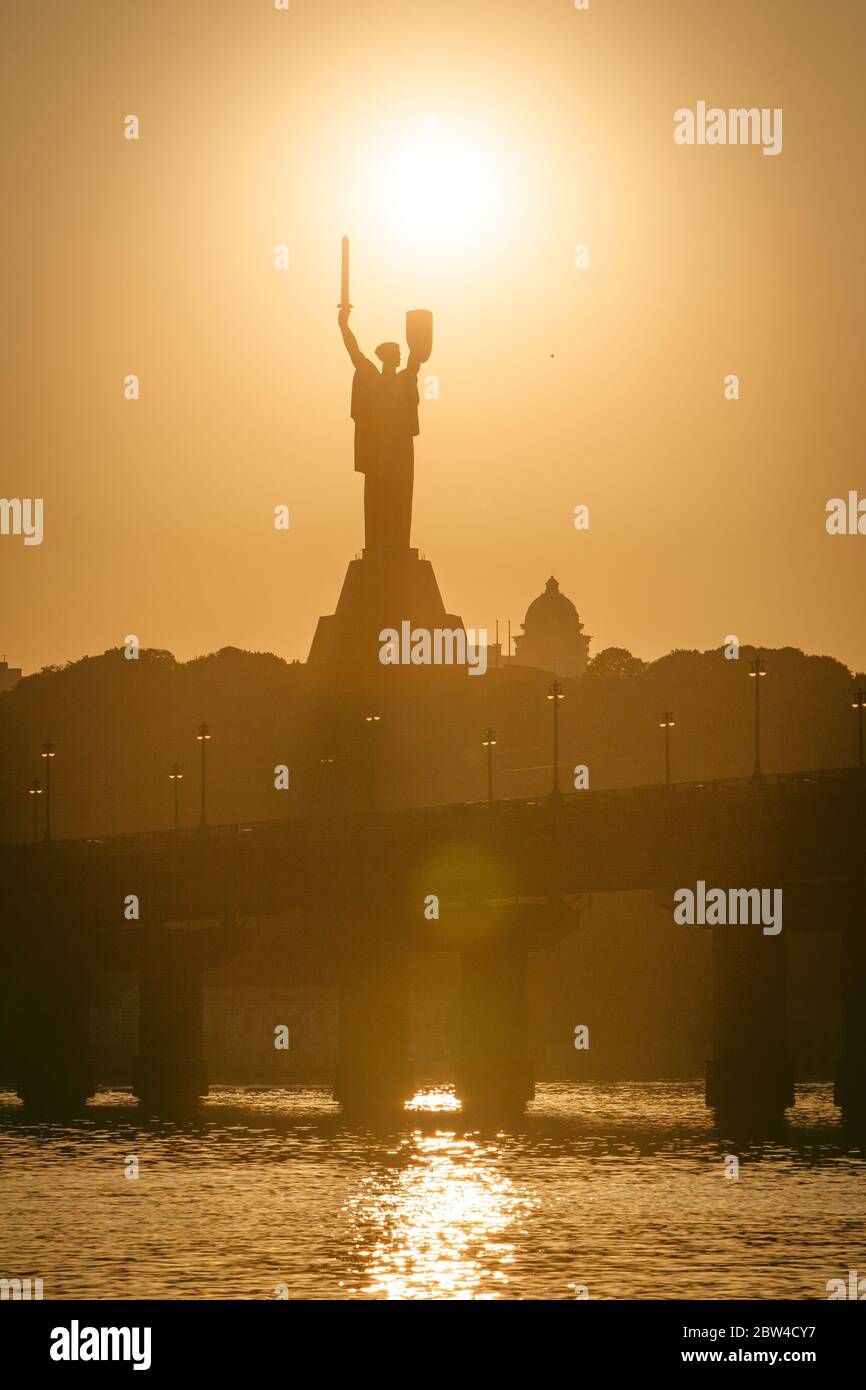 Monument to the motherland in Kiev in the rays of sunlight Stock Photo