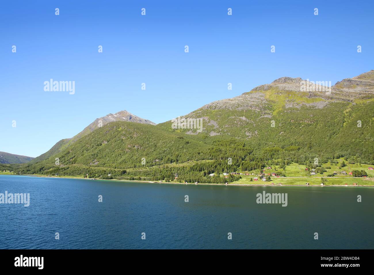 Beautiful scenic landscape of fjords, islands, village & inside passages; the Andfjorden & Vestfjorden, between Bodo & Hammerfest, Norway. Stock Photo