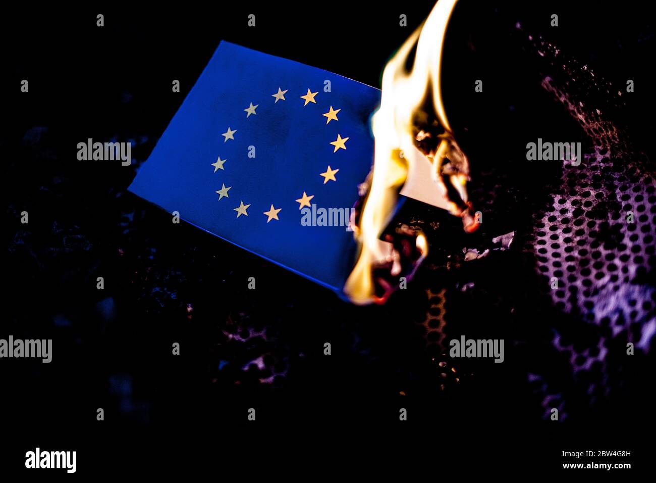 Bamberg, Germany May 28, 2020: Symbolic images - Coronavirus - 28.05.2020 Flame / fire with the European symbol / European flag / fire / out / walks Europe in financial smoke / Finances in Europe provide for fuel among the European countries / Europe / countries / | usage worldwide Stock Photo