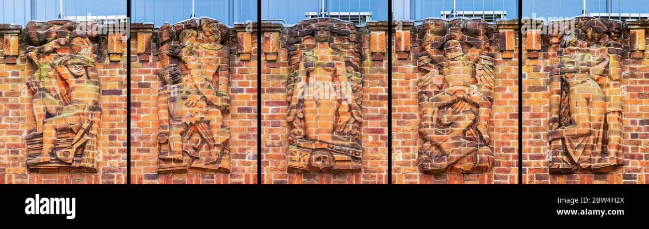 The five cut brick relief sculptures on the north wall of the RSC Shakespeare Memorial Theatre in Stratford Upon Avon, England Stock Photo