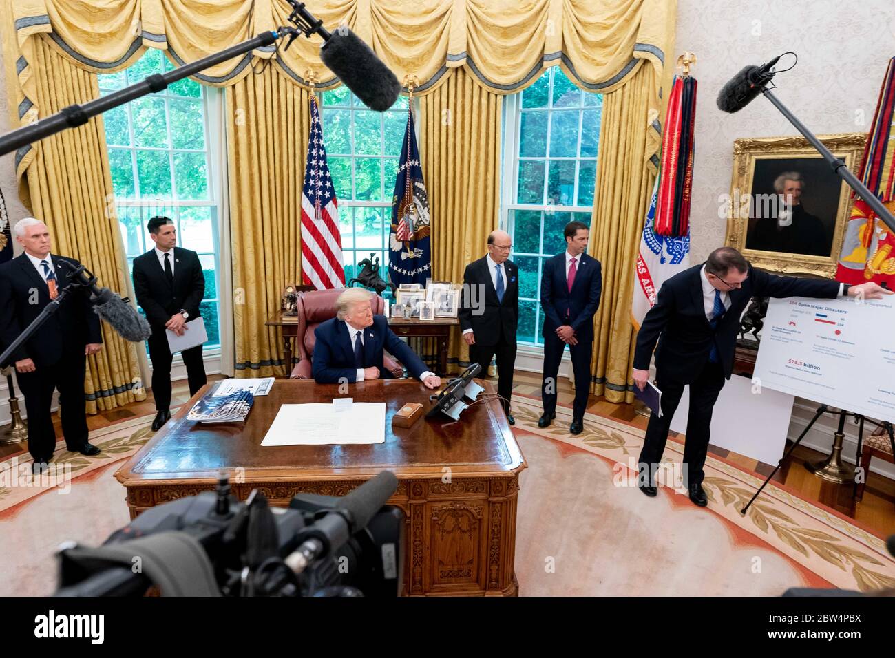 Washington, United States Of America. 28th May, 2020. Washington, United States of America. 28 May, 2020. U.S. President Donald Trump, joined by Vice President Mike Pence and senior staff, receives a briefing on the 2020 Hurricane Season in the Oval Office of the White House May 28, 2020 in Washington, DC Credit: D. Myles Cullen/White House Photo/Alamy Live News Stock Photo