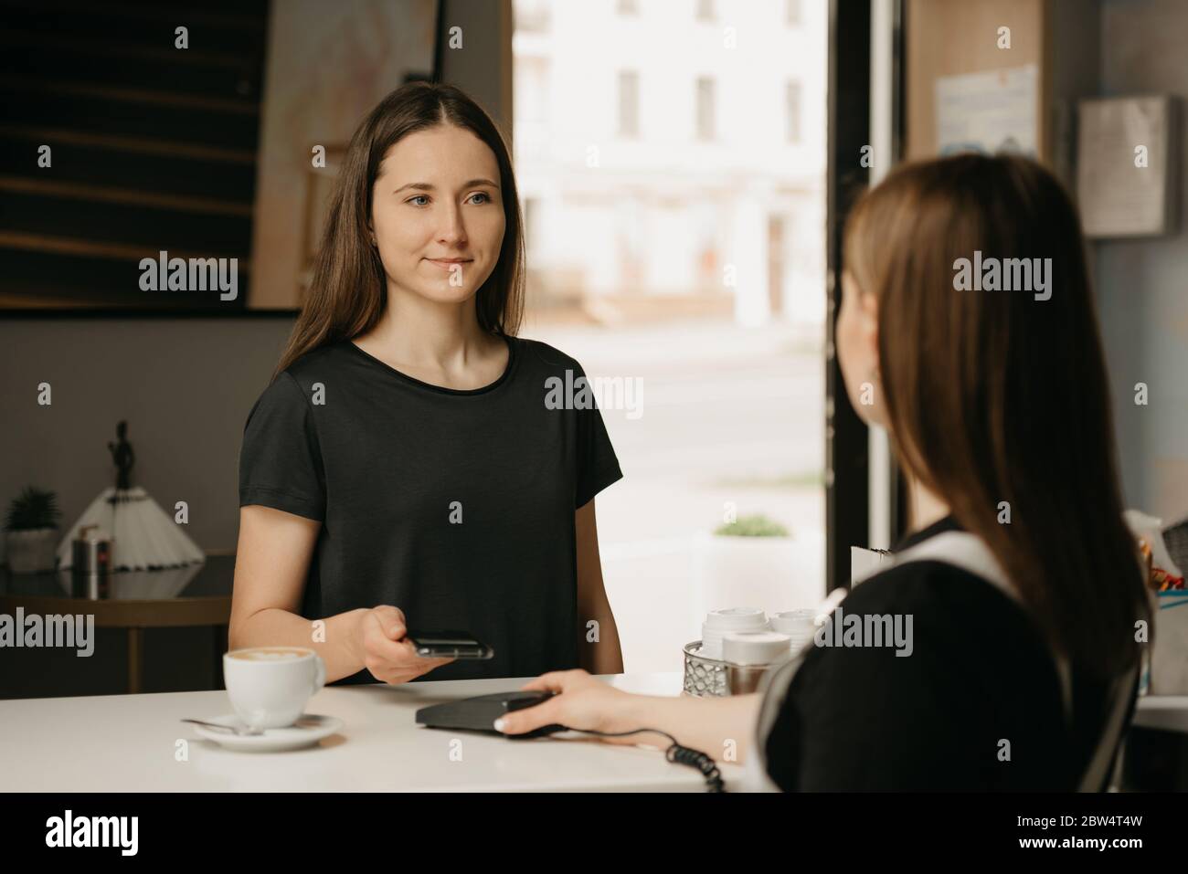 Happy girl long hair holds hi-res stock photography and images - Alamy