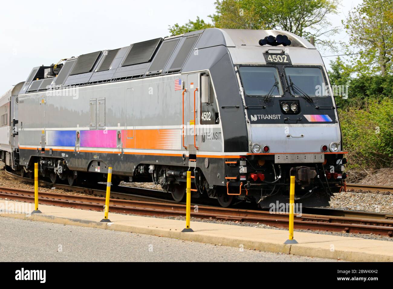 A New Jersey transit train pulling out of the Bay Head New Jersey Station. Bay Head New Jersey, USA Stock Photo