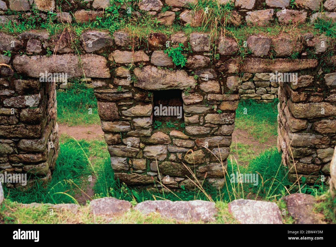 Stone walls ruins with doors from house in the ancient Inca city of ...