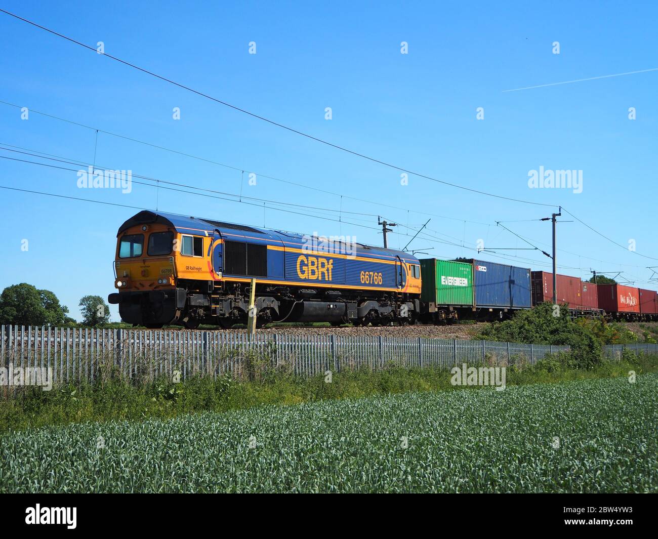 GBRF Class 66 Locomotive 66766 Leads an Intermodal Freight Train Past Northampton, UK Stock Photo