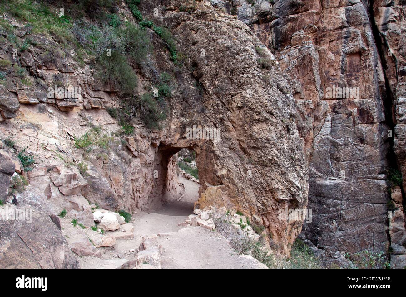 A tunnel through rock in the Grand Canyon Stock Photo Alamy