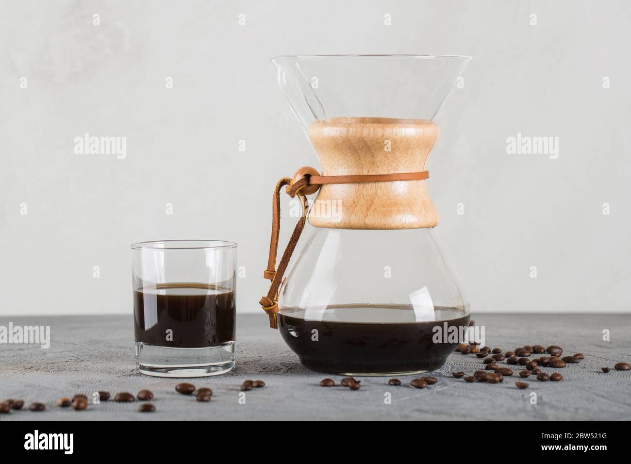 A device for brewing coffee using a filter. Close up on the table. Stock Photo