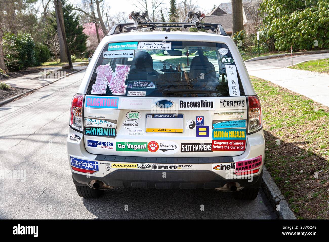 Rear View of Car with Various Stickers, Swarthmore College, Swarthmore Pennsylvania, USA Stock Photo