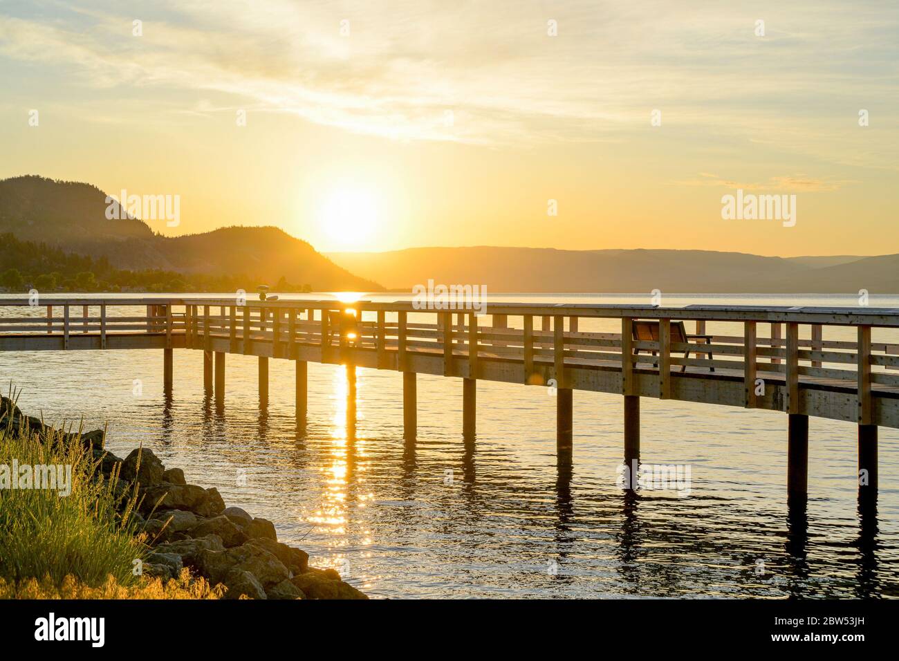 Sunrise, the Ray Kandola Heritage Pier, Peachland, British Columbia, Canada Stock Photo