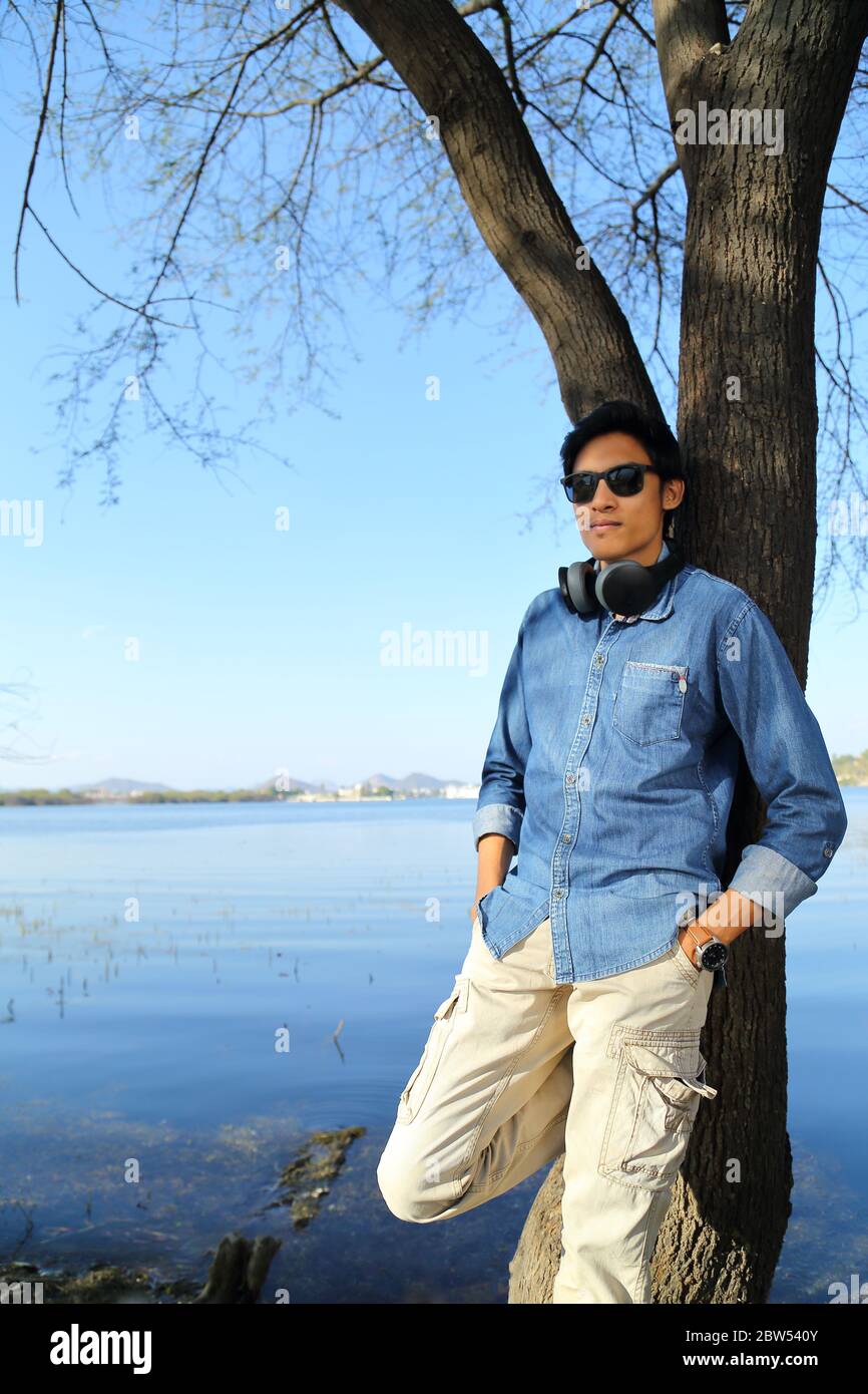Young male model showing lifestyle Stock Photo