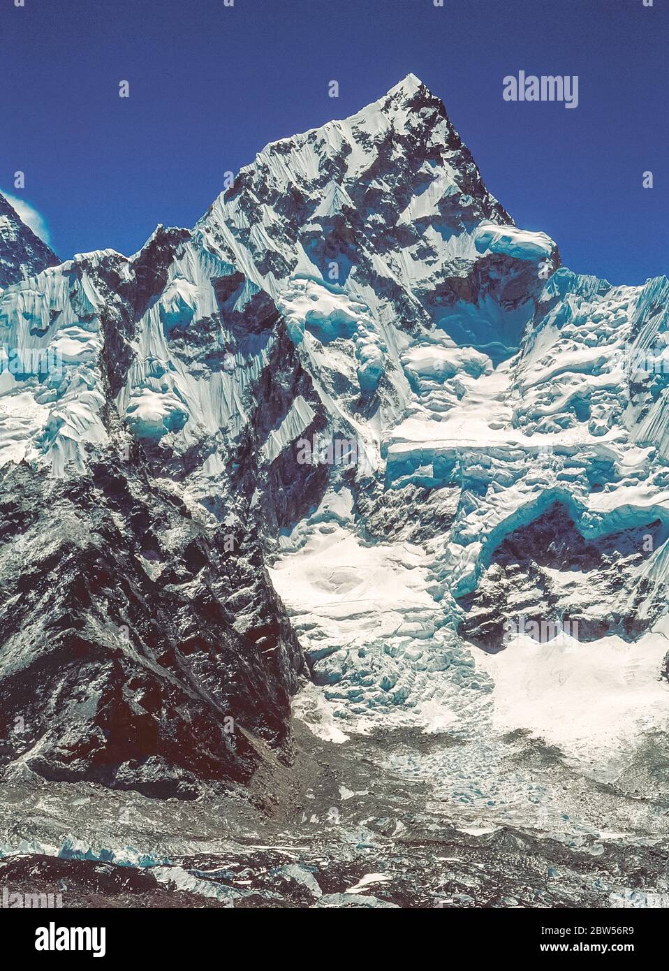 Nepal. Mount Everest [Chomolongma] 8848m the highest mountain in the world with its close neighbour Nuptse 7906m as seen here from Kalar Patar above Gorak Shep pasture Stock Photo