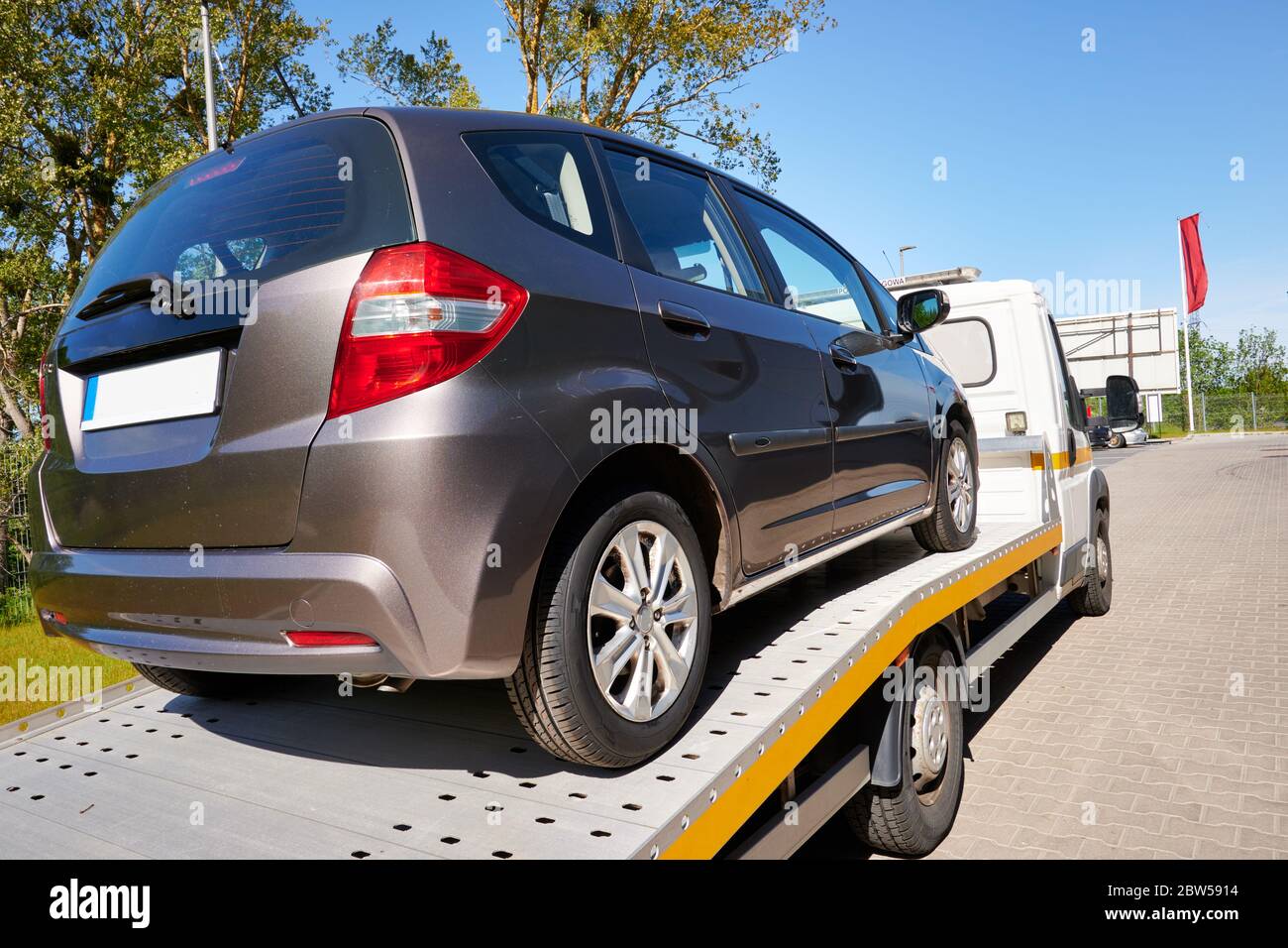 A car on tow truck for emergency car move. Stock Photo