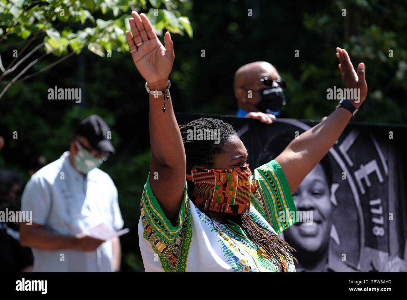 Portland, USA. 29th May, 2020. Urban League of Portland President Nkenge Harmon Johnson holds her hands in the air as protesters gather in Terry Shrunk Plaza in Portland, Ore., on May 29, 2020, to stand with the NAACP as they hold a 'Eulogy For Black America' honoring the lives of those lost to police brutality in response to the murder of George Floyd in Minneapolis by officer Derek Chauvin. (Photo by Alex Milan Tracy/Sipa USA) Credit: Sipa USA/Alamy Live News Stock Photo