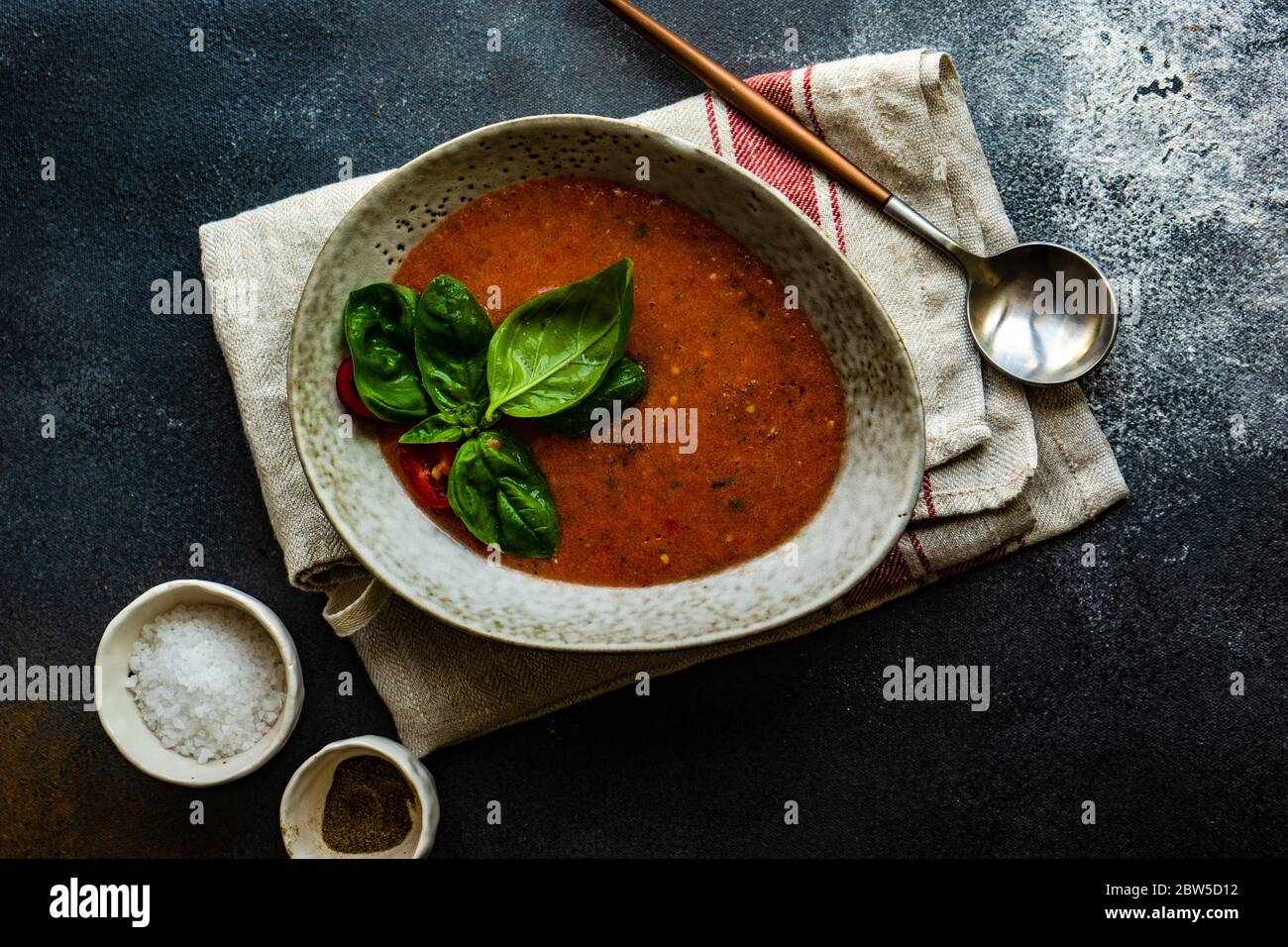 Traditional spanish tomato soup Gazpacho derved in ceranic bowl with