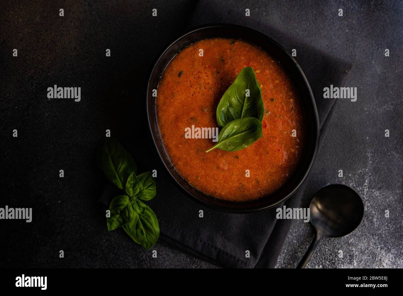 Traditional spanish tomato soup Gazpacho derved in ceranic bowl with