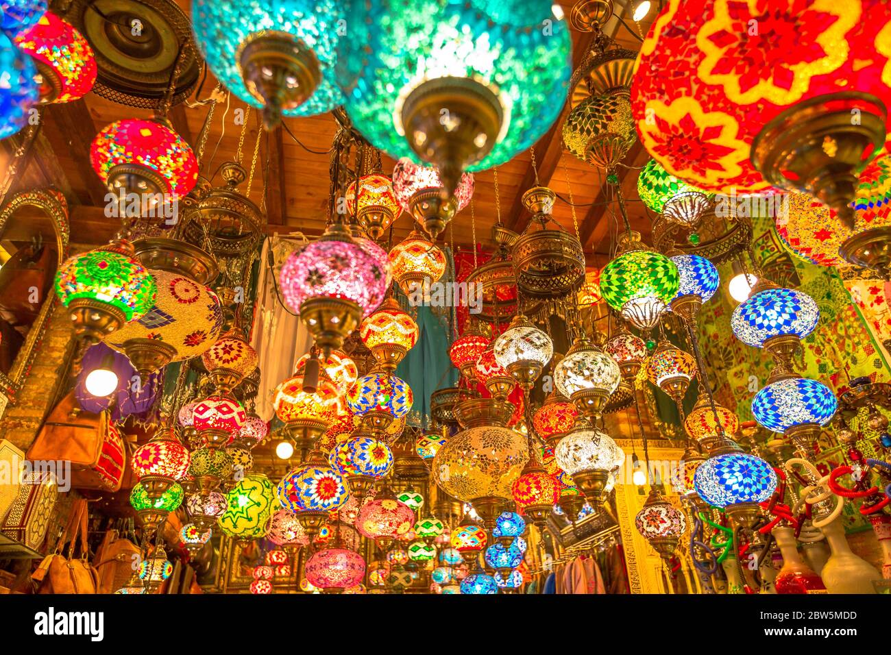 Colorful ceiling chandelier in Arab and Moroccan style. Lanterns lamp hanging down from the ceiling. Stock Photo