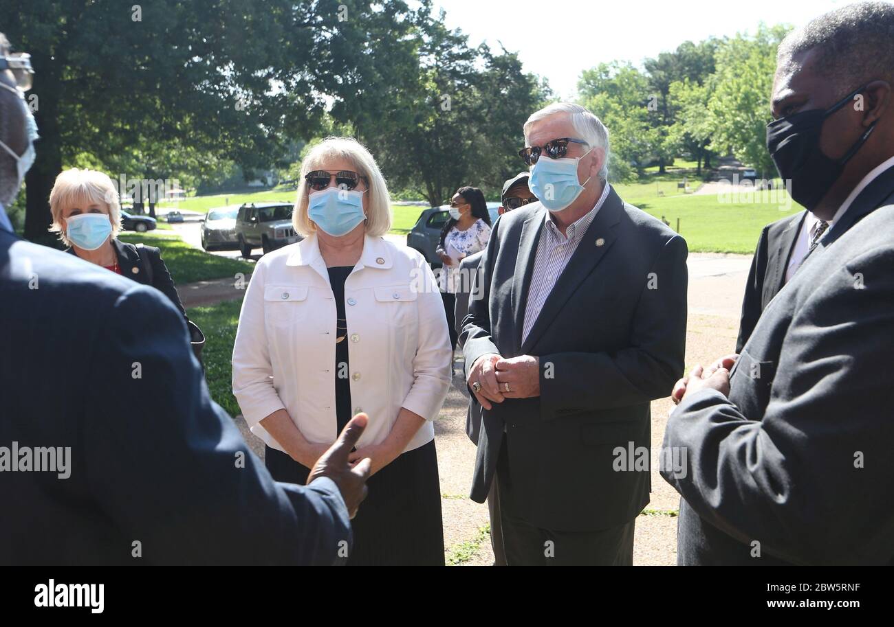 Hanley Hills, United States. 29th May, 2020. Missouri Governor Mike Parson and Missouri First Lady Teresa Parson, talk with faith leaders before handing out face masks at The Mt. Beulah Missionary Baptist Church, in .Hanley Hills, Missouri on Friday, May 29, 2020. The first couple handed out the masks to church leaders who plan on reopening their places of worship this Sunday. Photo by Bill Greenblatt/UPI Credit: UPI/Alamy Live News Stock Photo