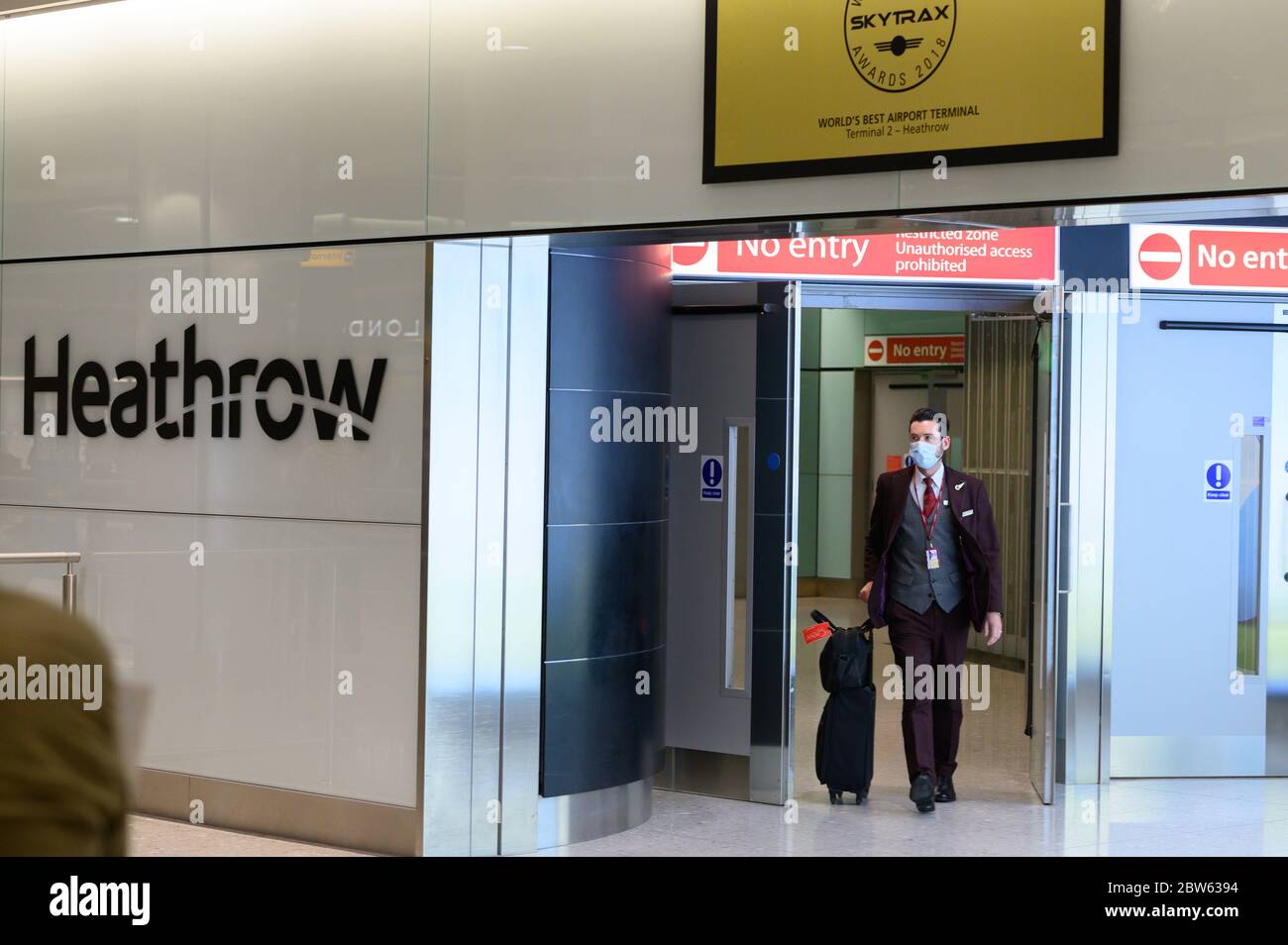 Flight attendant returning to Heathrow Terminal 2 on the penultimate