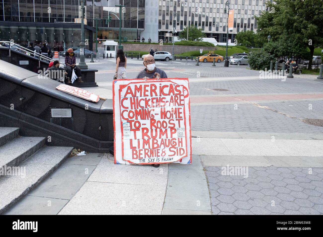 New York, New York, USA. 29th May, 2020. A demonstrator posts' a sign during a demonstration at Foley Square in New York, New York. For the second day protesters took to the street rallying against recent police misconduct, racial killings and altercations against African Americans Credit: Brian Branch Price/ZUMA Wire/Alamy Live News Stock Photo
