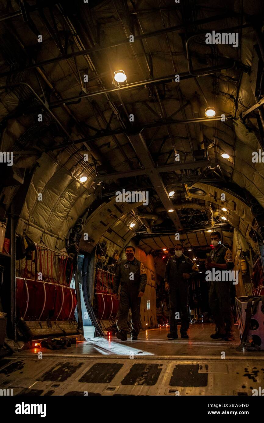 HERMOSILLO, MEXICO - MAY 28:Soldiers from the Mexican army and air force unload medical equipment and supplies from the Hercules C-130 aircraft at Air Base no. 18 to implement Plan DN-III-E and attend to the Covid-19 health emergency  Arrival of the Spartan C27J aircraft from Mexico City to the No.18 Military Air Base loaded with medical equipment and supplies to attend the health emergency by Covid-19    Soldados del ejército y la fuerza aérea mexicanos descargan equipos médicos y suministros de la aeronave Hercules C-130 en la Base Aerea no. 18 para implementar el Plan DN-III-E y atender la Stock Photo