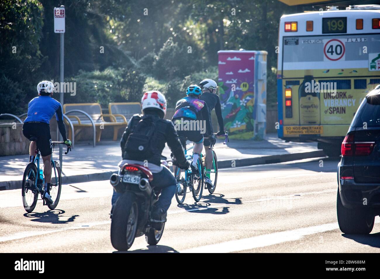 Transport modes road cycling, car, motorbike and public bus in Sydney
