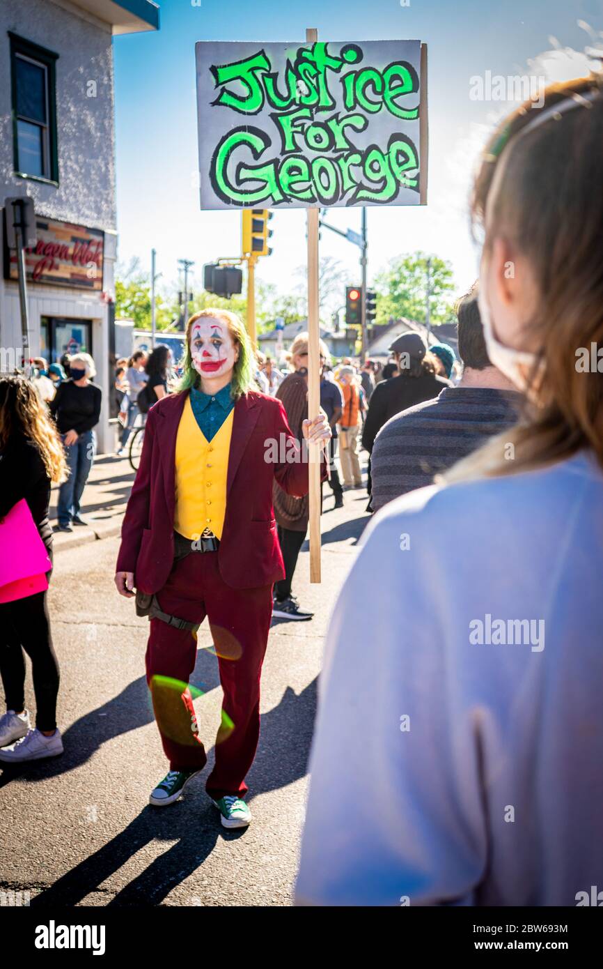 joker costume demonstrator for justice for george floyd minneapolis riots Stock Photo
