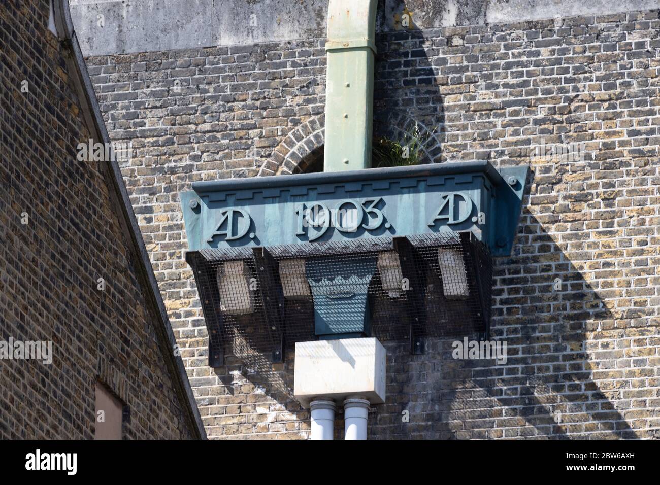 Guttering downpipes Hopper Head dated AD 1903, Stock Photo