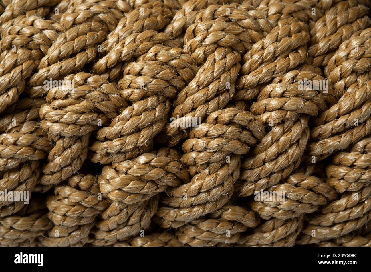 New handmade knotted rope close up full frame Stock Photo