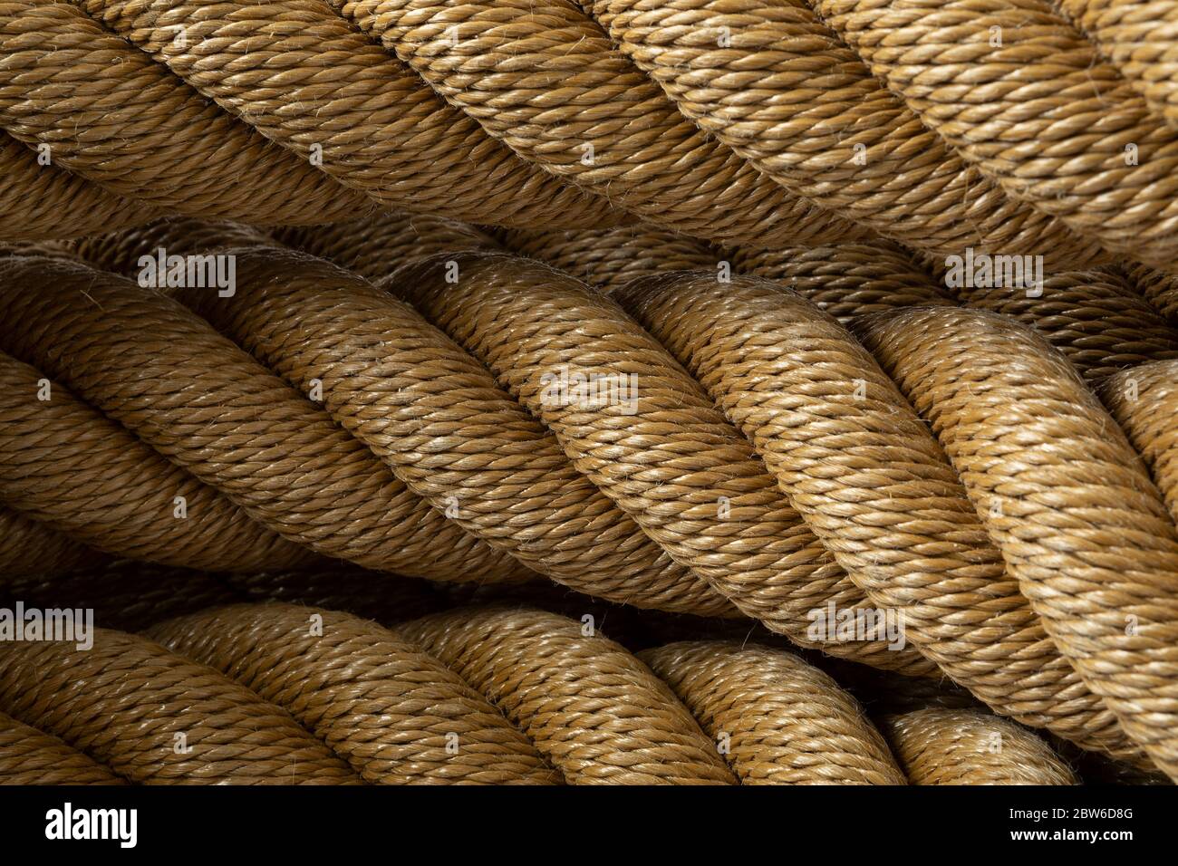 New handmade knotted rope close up full frame Stock Photo