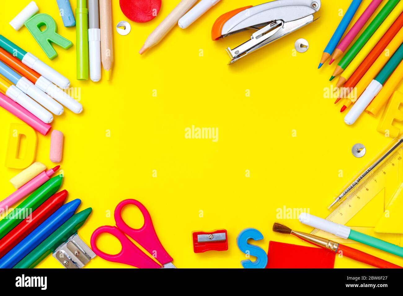 Modern back to school flatlay, great design for any purposes. Yellow table  background. Learning concept. Design element. Education concept. Poster des  Stock Photo - Alamy