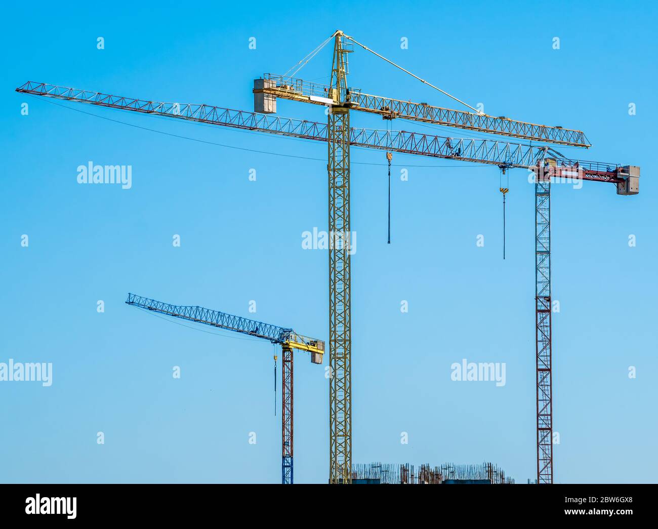 Construction crane or building crane on a construction site. Stock Photo