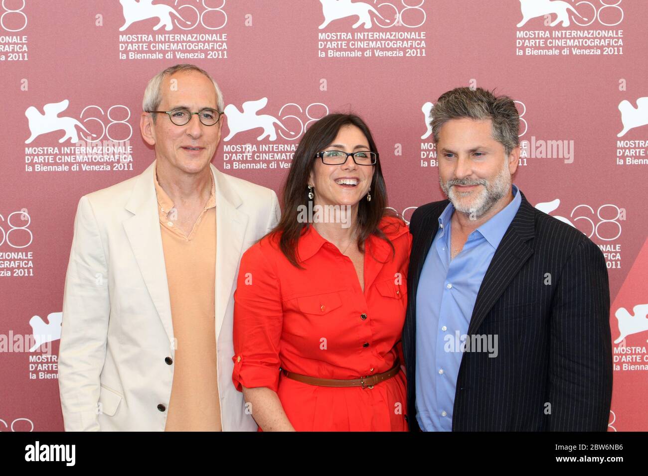 VENICE, ITALY - SEPTEMBER 03: Michael Shamberg, Stacey Sher and Gregory Jacobs poses at the 'Contagion' photocall during the 68th Venice Film Festival Stock Photo