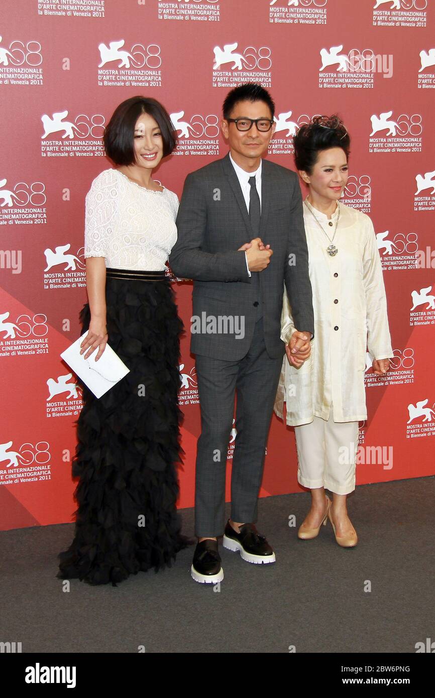 VENICE, ITALY - SEPTEMBER 05: Qin Hailu, Andy Lau and Deanie Ip attends the "Tao Jie" Photocall during the 68th Venice Film Festiva Stock Photo
