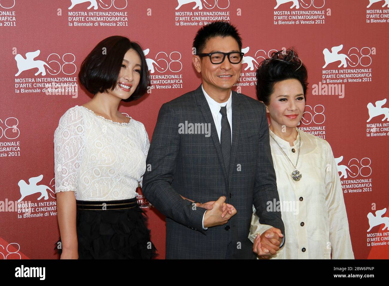 VENICE, ITALY - SEPTEMBER 05: Qin Hailu, Andy Lau and Deanie Ip attends the 'Tao Jie' Photocall during the 68th Venice Film Festiva Stock Photo