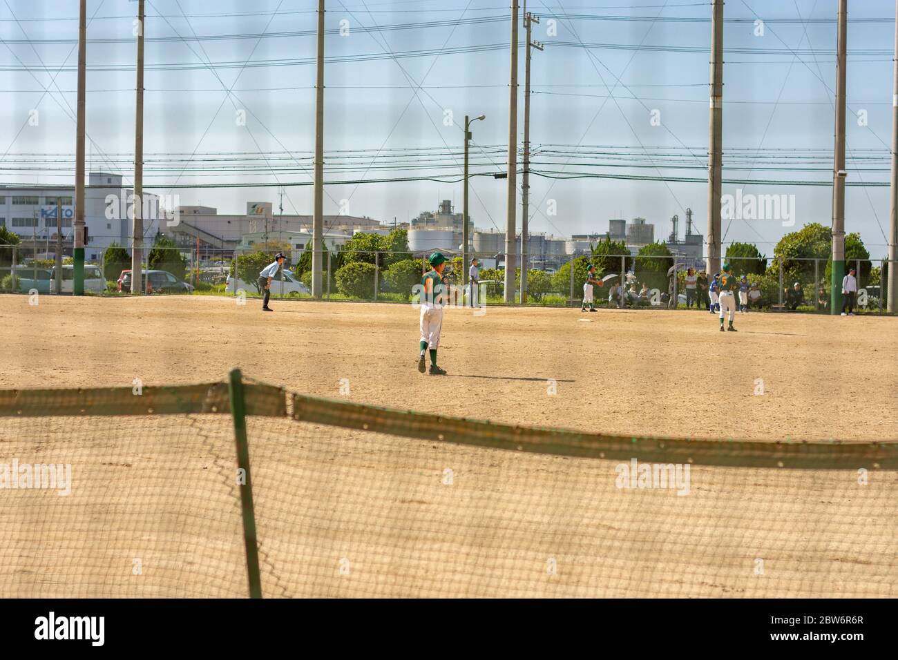 Osaka / Japan - September 30, 2017: Children playing baseball in the schoolyard in Osaka, Japan Stock Photo