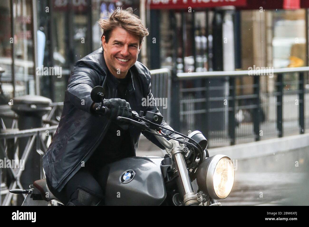 Tom Cruise riding motorbike in front of crowd filming Mission Impossible 3  in Paris, France, 2017 Stock Photo - Alamy