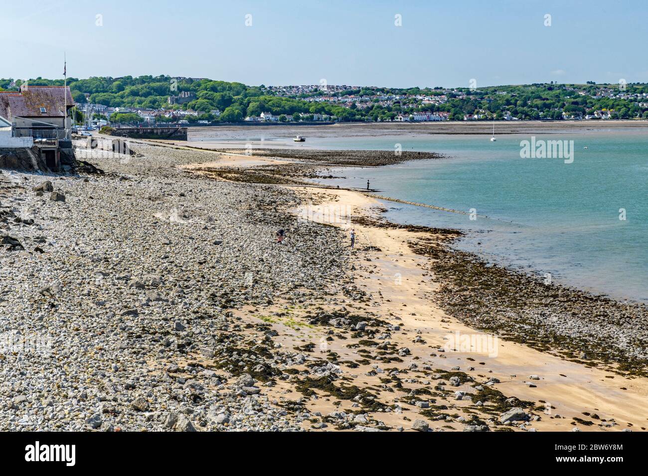 Mumbles Seafront looking towards Oystermouth and Oystermouth Castle on the Swansea Bay seafront. A sunny day in July. Stock Photo