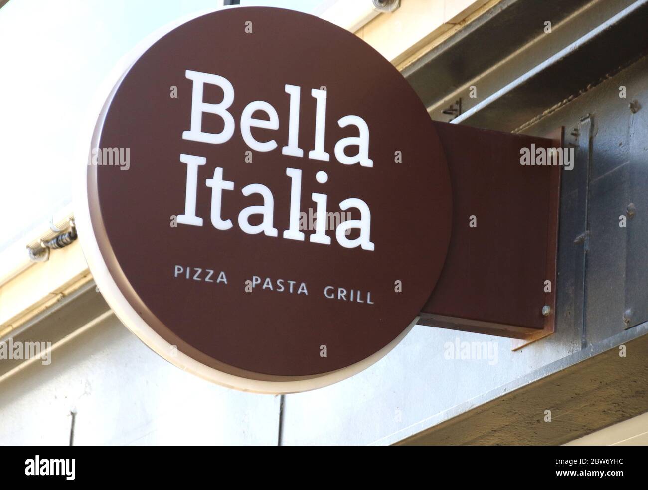 Bella Italia logo seen at one of their branches.UK Government has announced that a number of non-essential retail enterprises such as Outdoor markets, car showrooms can reopen from June 1st and June 15th other shops, department stores will also open and shopping centres, restaurants and bars will still remain shut. Stock Photo