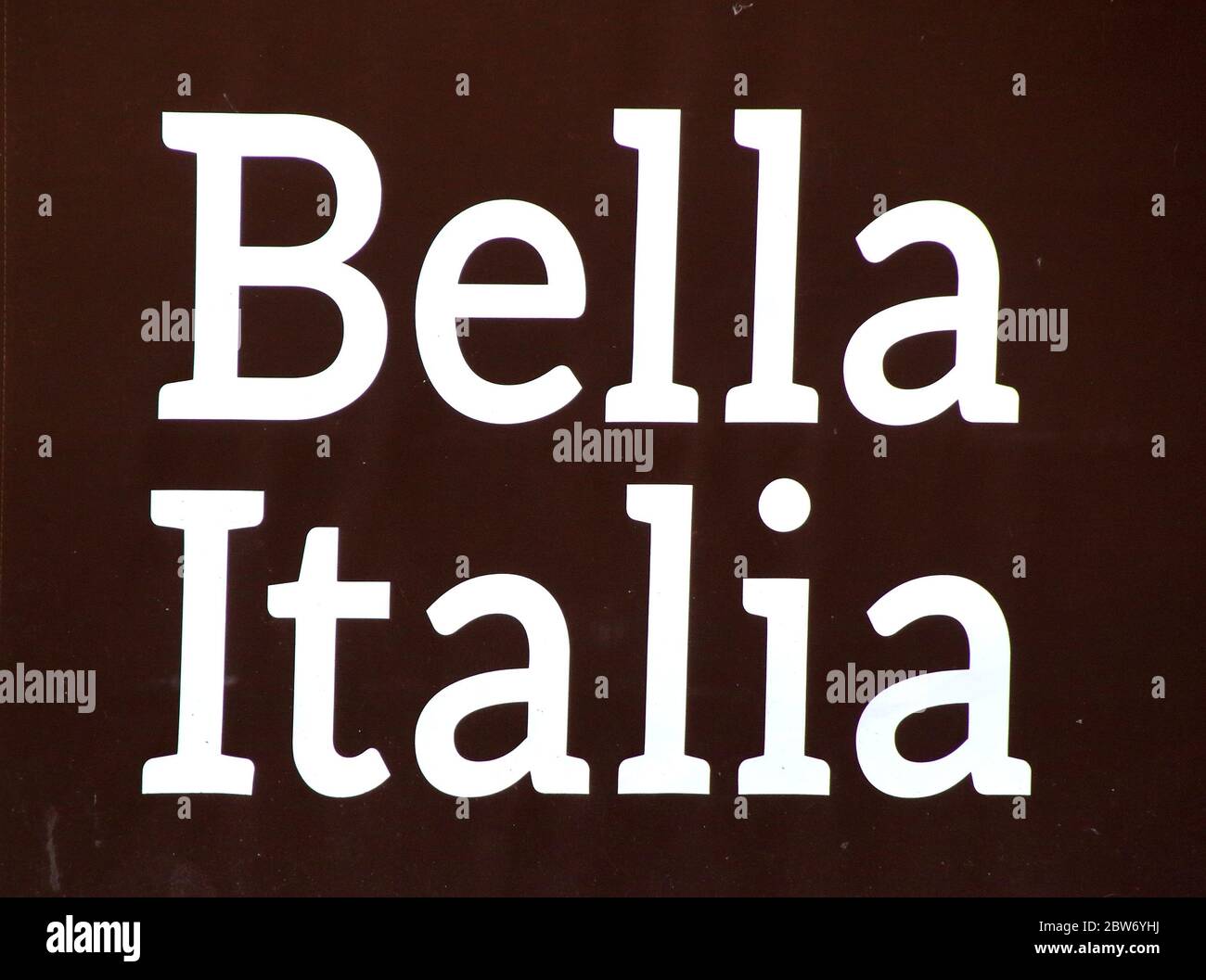 Bella Italia logo seen at one of their branches.UK Government has announced that a number of non-essential retail enterprises such as Outdoor markets, car showrooms can reopen from June 1st and June 15th other shops, department stores will also open and shopping centres, restaurants and bars will still remain shut. Stock Photo