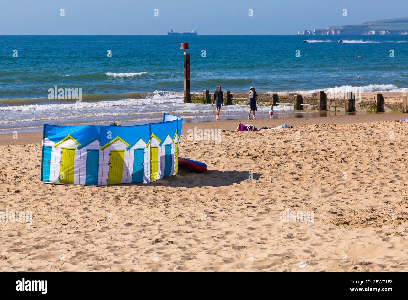 Bournemouth, Dorset UK. 30th May 2020. UK weather: hot sunny day at Bournemouth beaches as the glorious weather continues and temperatures rise with clear blue skies and unbroken sunshine. Sunseekers head to the seaside early to get a good spot and enjoy the sunshine, as the beaches are expected to get packed later. Credit: Carolyn Jenkins/Alamy Live News Stock Photo