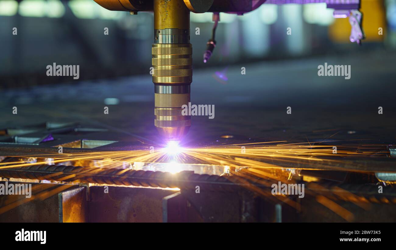 Plasma cut machine cutting steel sheet with sparks Stock Photo Alamy